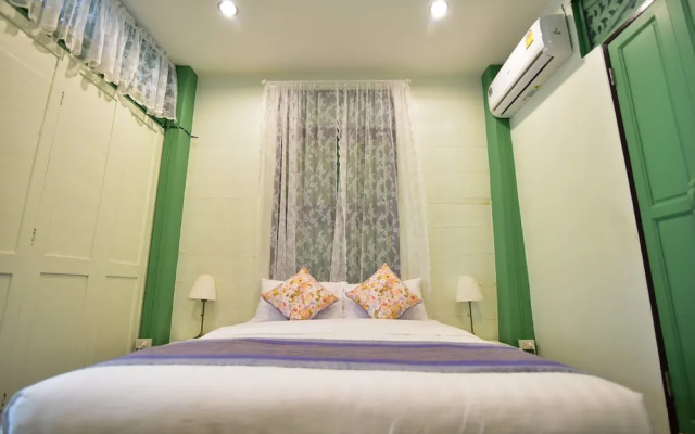 Green Teak House
