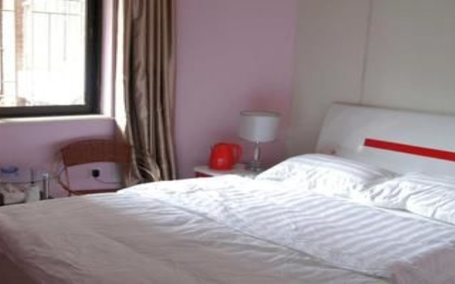 Отель Gulangyu Lianhe Apartment Hotel - Xiamen Китай, Сямынь - отзывы, цены и фото номеров - забронировать отель Gulangyu Lianhe Apartment Hotel - Xiamen онлайн комната для гостей