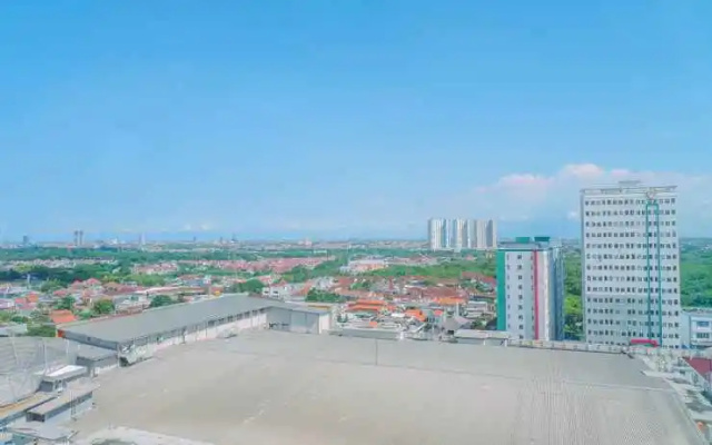 Lavish 2BR Apartment at Grand Sungkono Lagoon By Travelio