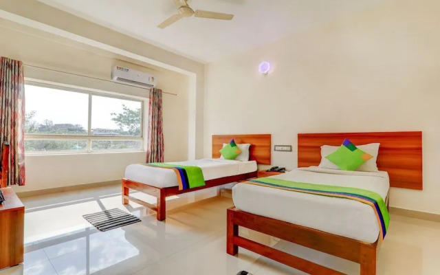 Treebo Atithi Comforts, 1 Km From Nisargadhama Forest