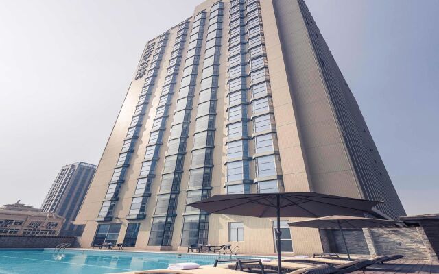 Отель Mercure Xiamen Exhibition Centre вид на фасад