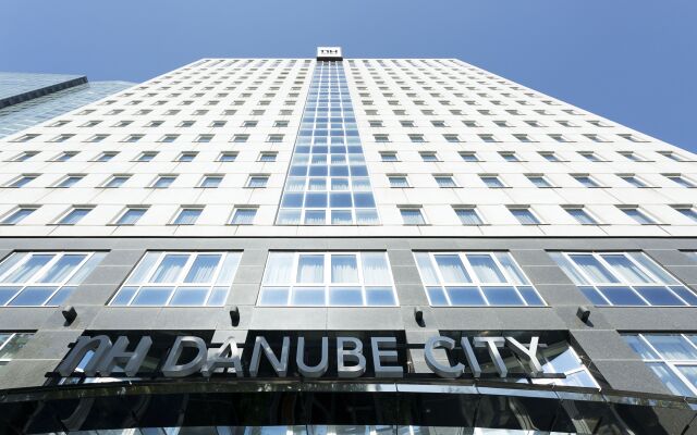 Отель NH Danube City Австрия, Вена - отзывы, цены и фото номеров - забронировать отель NH Danube City онлайн вид на фасад