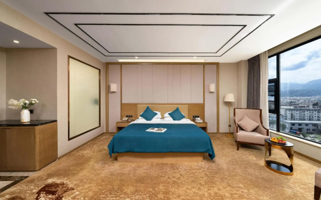 Fuying Hotel (Baoshan Station Wuzhou International Plaza)