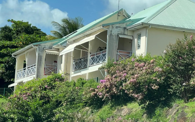 Zabana Lodge, dans un jardin tropical avec piscine