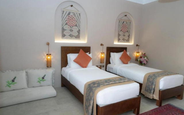 Отель Al Rayaheen Retreat by Sharjah Collection