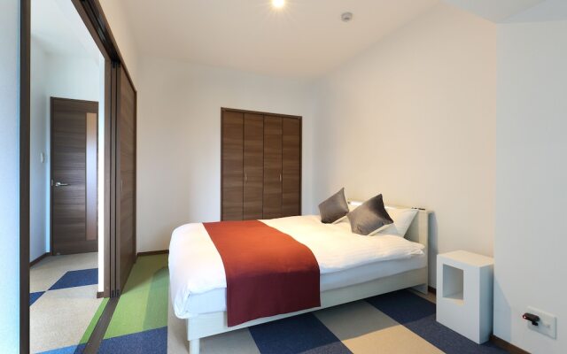 Residence Hotel Hakata 16 Фукуока комната для гостей