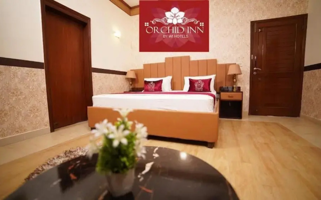 Orchid Inn By WI