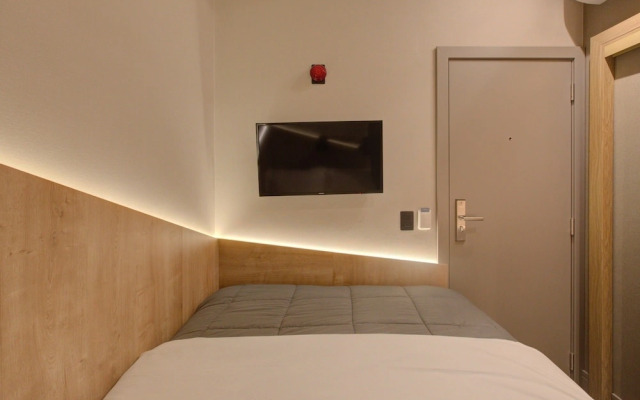 Fast Sleep Suites by Slaviero Hotéis dentro do Aeroporto Guarulhos Terminal 2, desembarque Oeste
