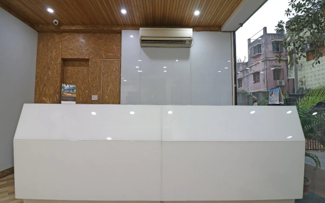 Capital O 7743 Hotel Hiland International