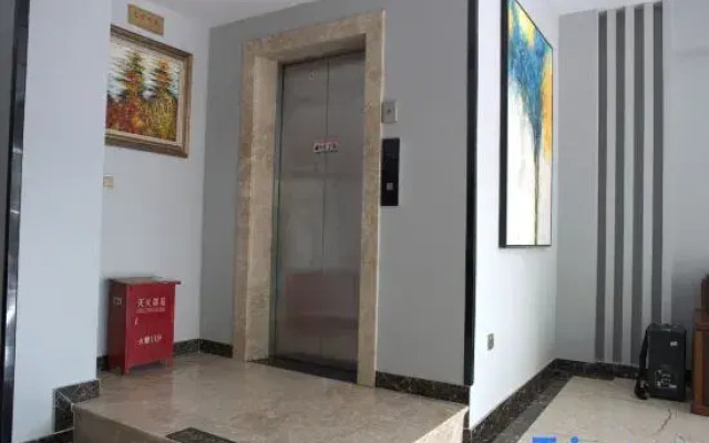 Huaji Business Hotel