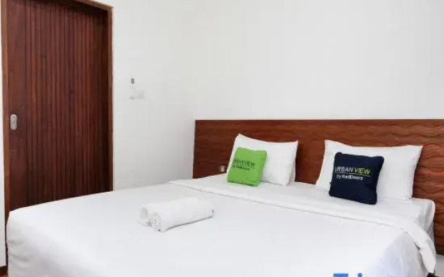 Urbanview Hotel Arta Guna Casa