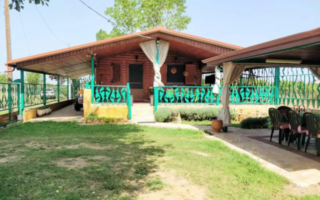 Ikos Olympus - Elegant wooden cabin house near the beach