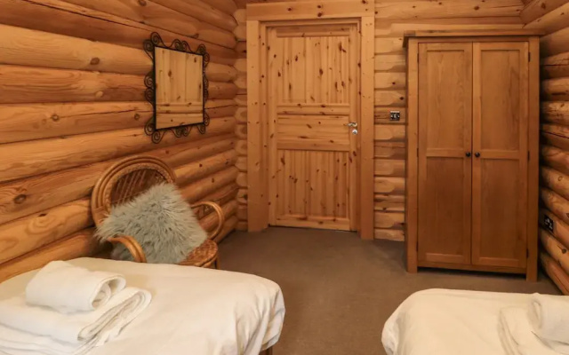 Welcome Hjem Log Cabin
