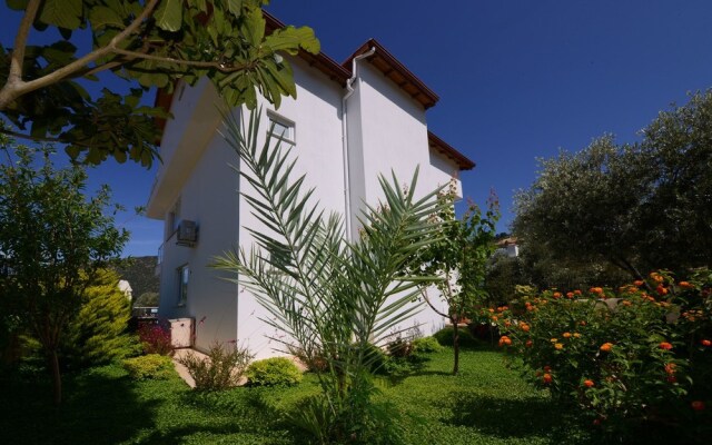 Отель Villa Mercan 1 by Akdenizvillam Калкан вид на фасад