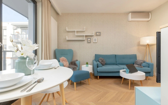 Bright Blue Apartment by Renters