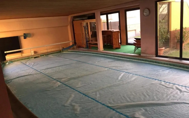 Grande Chambre climatisée chez Xavier