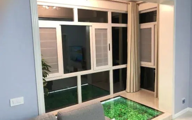 Danjiangkou Threeofus Apartment
