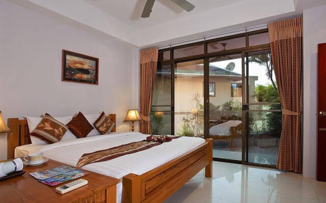 Отель Baan Song Thai Villa - 4 Bed комната для гостей