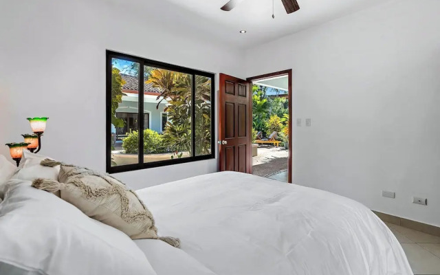 Stylish Home with Chic Decor, Luxury Amenities & Tropical Outdoor Oasis with Sparkling Private Pool