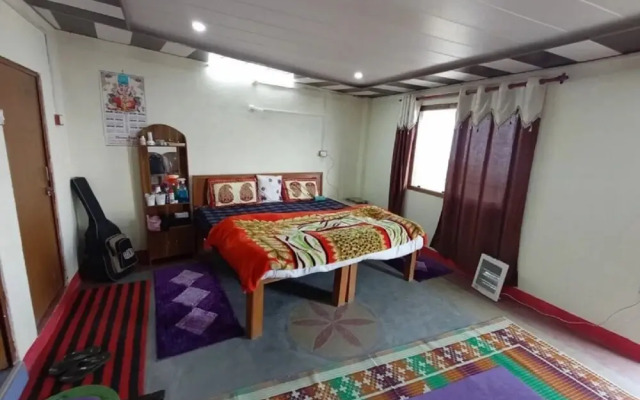 Goroomgo Ananda Homestay Kausani