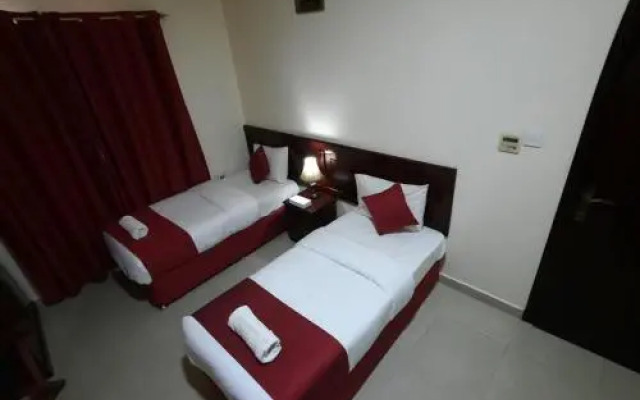 Отель Oyo 156 Al Reem Hotel Apartments