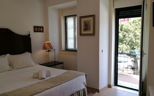 Отель Discovery Apartament Lisboa Lapa Estrela Лиссабон комната для гостей