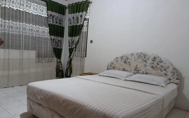OYO 93706 Penginapan Syariah Hj. Kenan