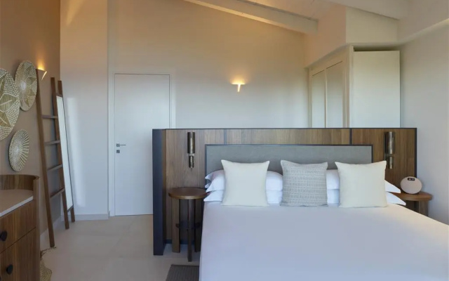 Baia di Chia Resort Sardinia, Curio Collection by Hilton