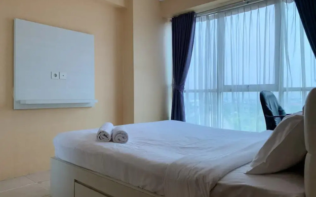 Warm And Cozy 2Br At Tifolia Apartment