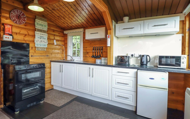 Y Bwthyn Pren, Cabin 209,