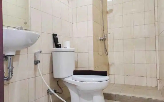 Comfy and Homey 2BR at Vida View Apartment By Travelio