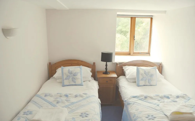 A spacious barn conversion with charming features near Looe