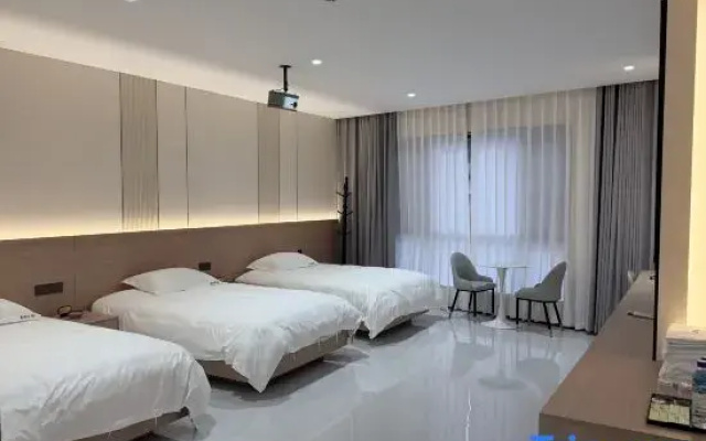 Mile Xinyuan Hotel