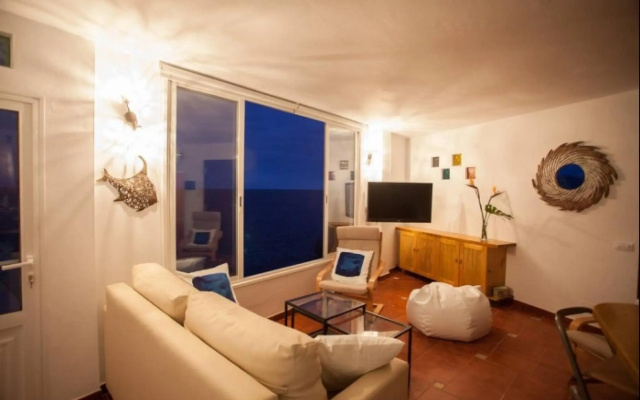 Canary casita next to the Atlantic Ocean