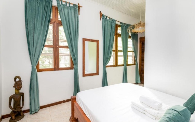 Kima Serviced Beach House & Suites