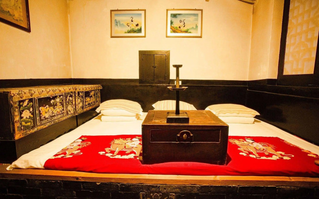 Отель Pingyao Yixingtong Inn