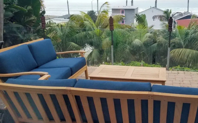 Tropical Oceanside Home w/ Deck, Walk to Beach