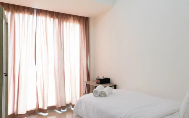 Cozy and Minimalist Studio Apartment @ Tree Park BSD by Travelio