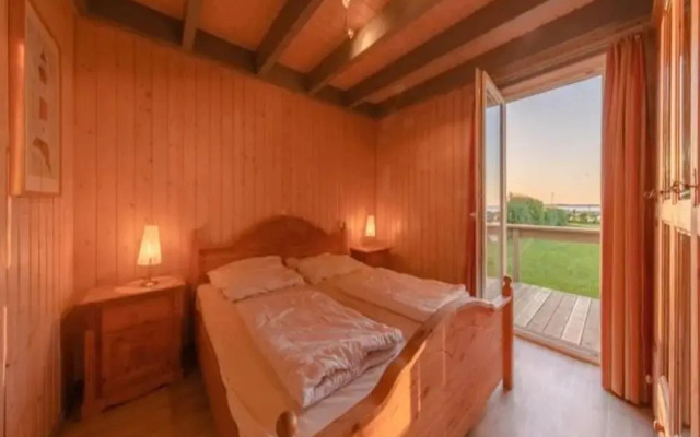 Ferienhaus mit Terrasse und Balkon