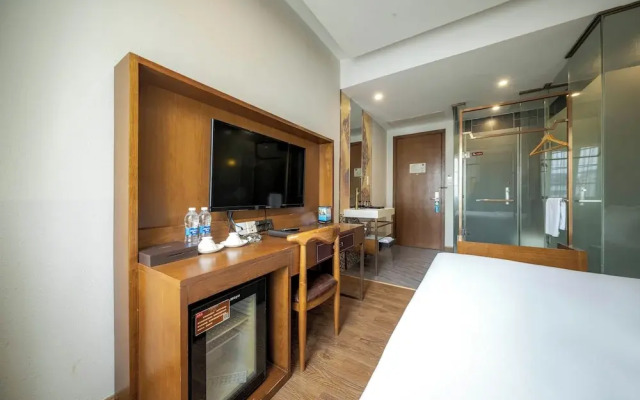 Xingyi Chain Hotel Jiangxia Metro Station