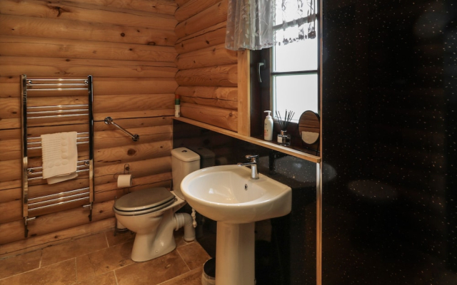 Welcome Hjem Log Cabin