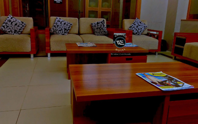 WE Hotel and Suites
