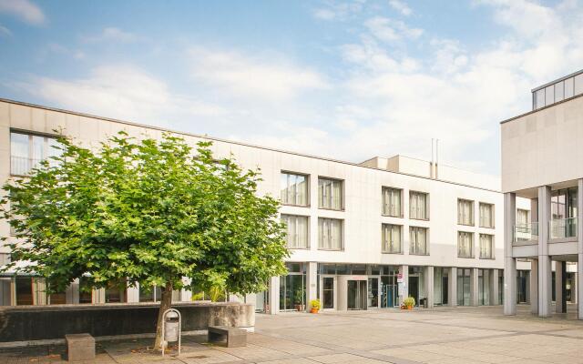 Отель Vienna House Easy Trier вид на фасад