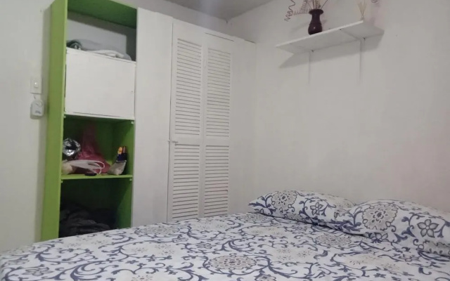 Room in Guest Room - Green Sea Inn in the San Luis Sector