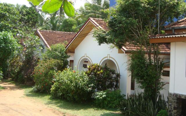 Отель The Tandem Guesthouse Шри-Ланка, Хиккадува - отзывы, цены и фото номеров - забронировать отель The Tandem Guesthouse онлайн вид на фасад