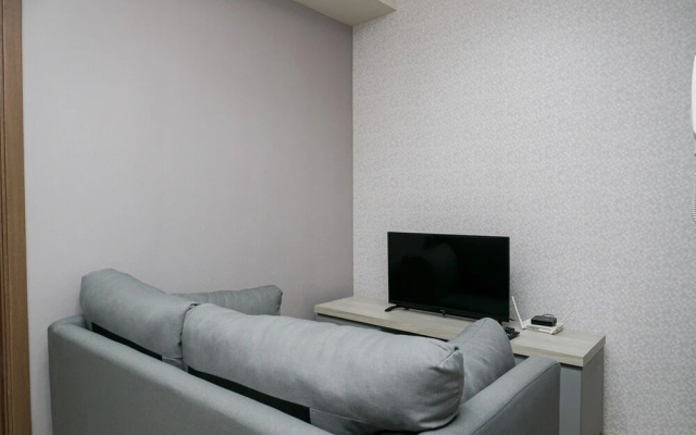 Cozy 1BR at Puri Orchard Apartment