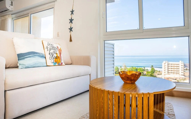 Ocean View Condo Steps to Beach & Comfort
