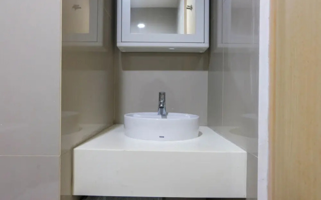 Cozy and Minimalist Studio Apartment @ Tree Park BSD by Travelio