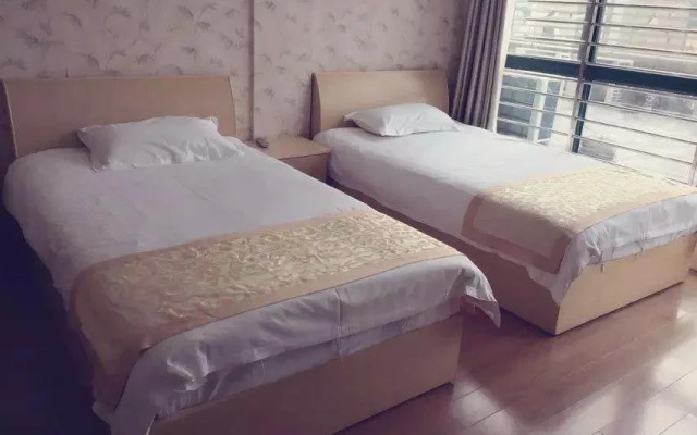 Wanhao Bussiness Hotel Siyang