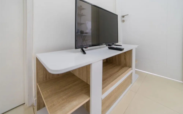 Minimalist Apartment with Sofa Bed at Parahyangan Residence